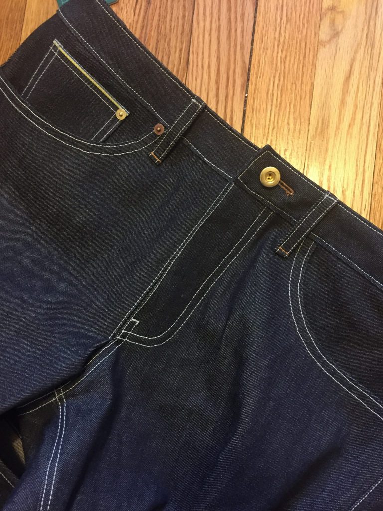 mens jeans top stitching and hardware detail