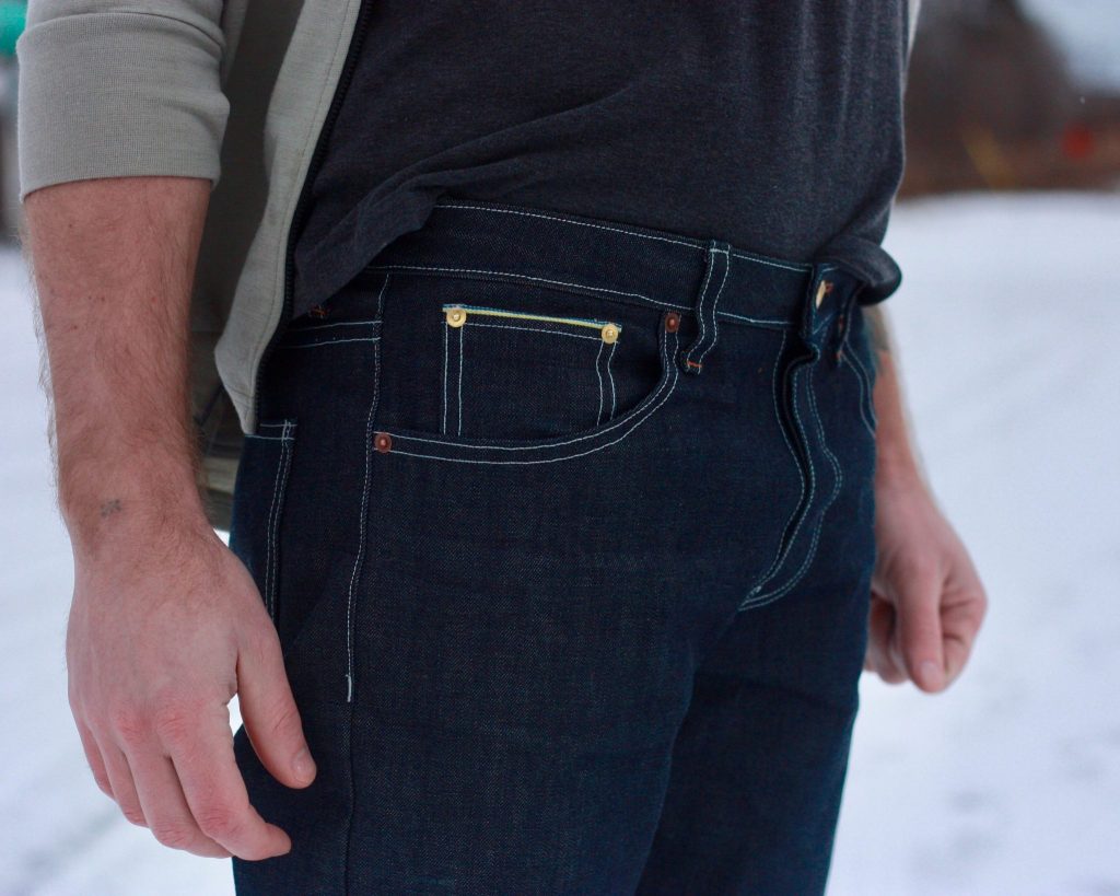 gold rivets above selvedge coin pocket