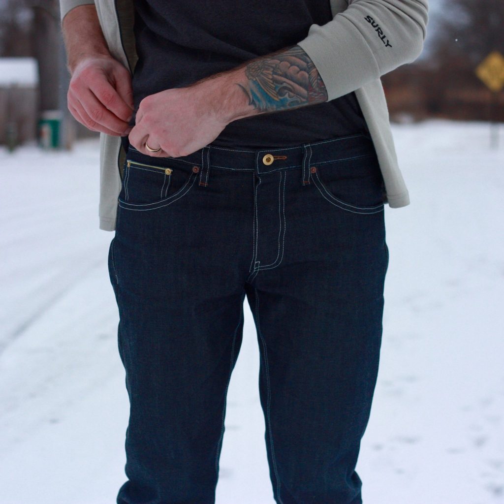 reflective jeans front view with wool cycling jersey